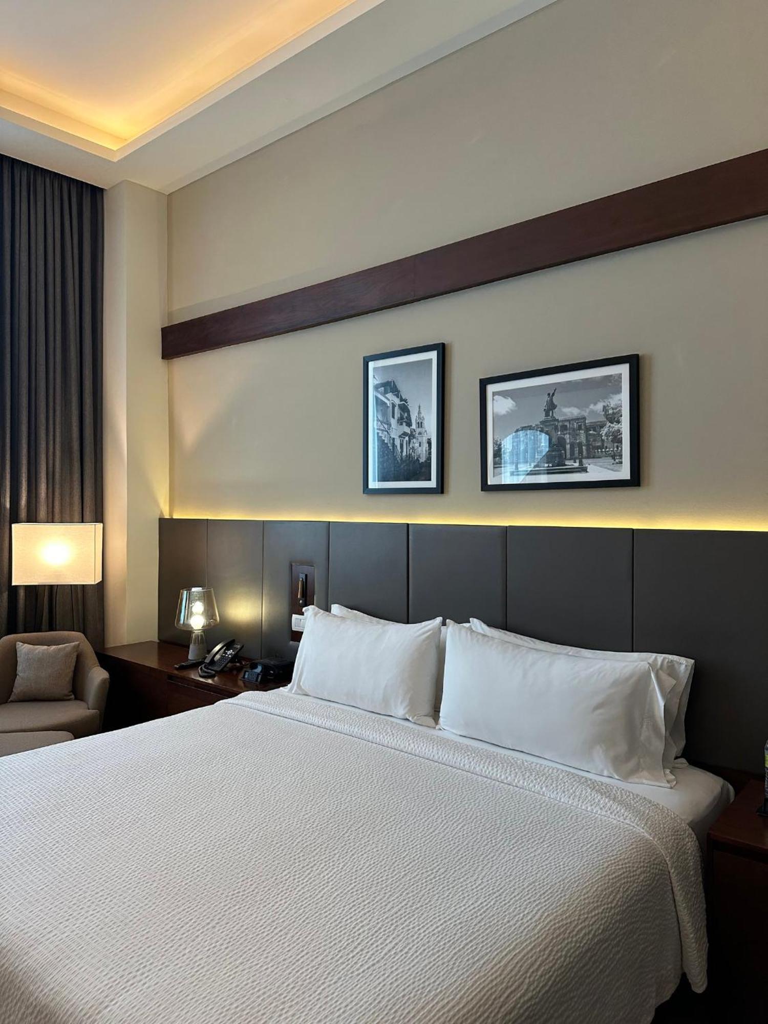 Holiday Inn Santo Domingo By Ihg Eksteriør bilde A bedroom at the hotel
